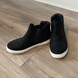 Black hightop sneakers